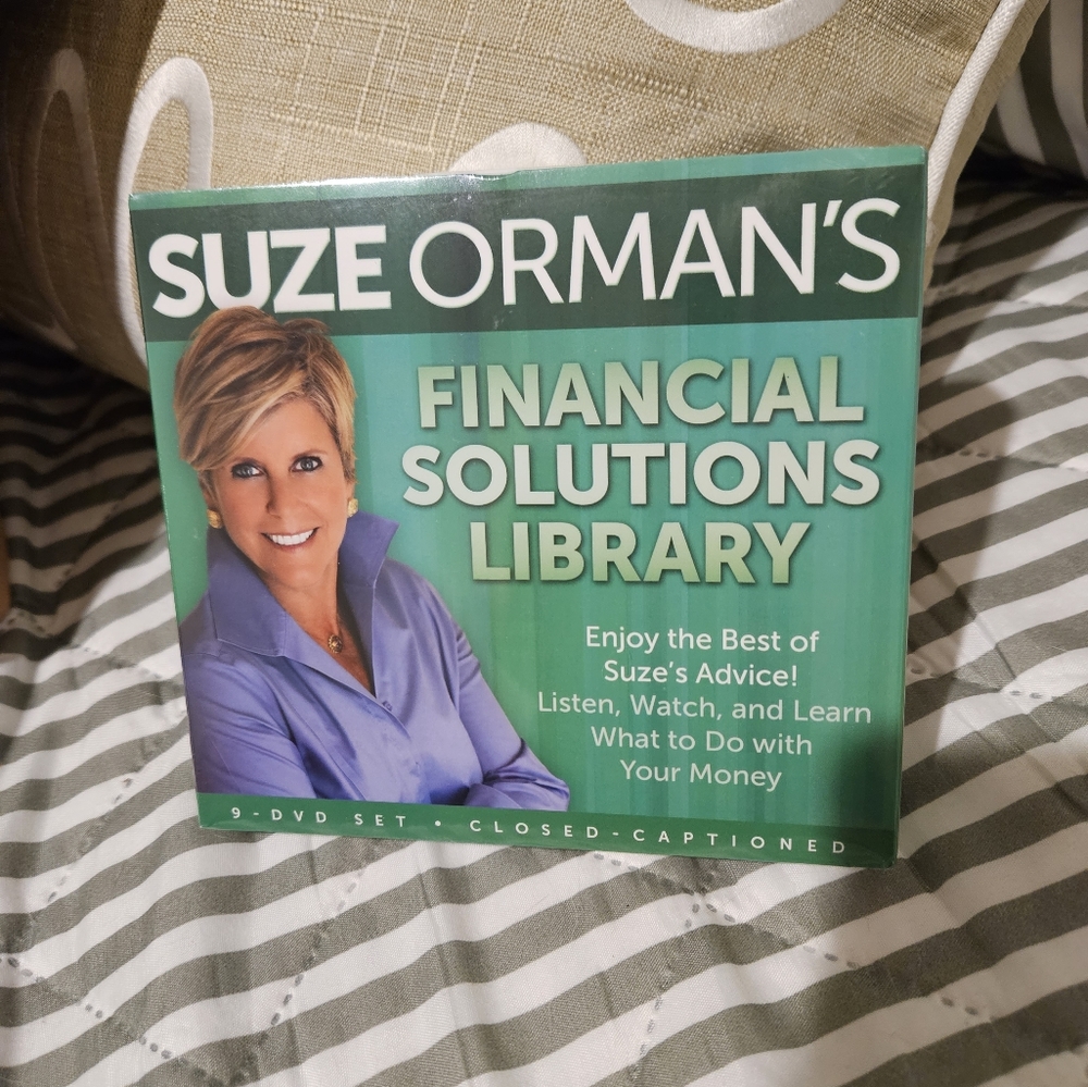 Suze Orman's Financial Solutions Library-New, unopened 9 DVDs, closed captioned